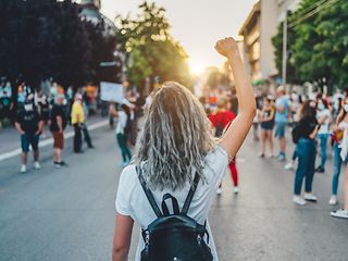 Young woman on a protest march