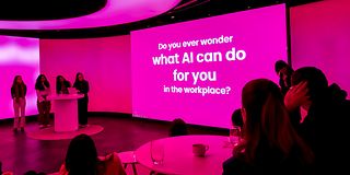 A group of Femtec scholarship holders presenting their results from the Femtec Innolab at Telekom's T Gallery.