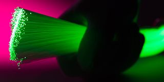 A bundle of fiber optics in green